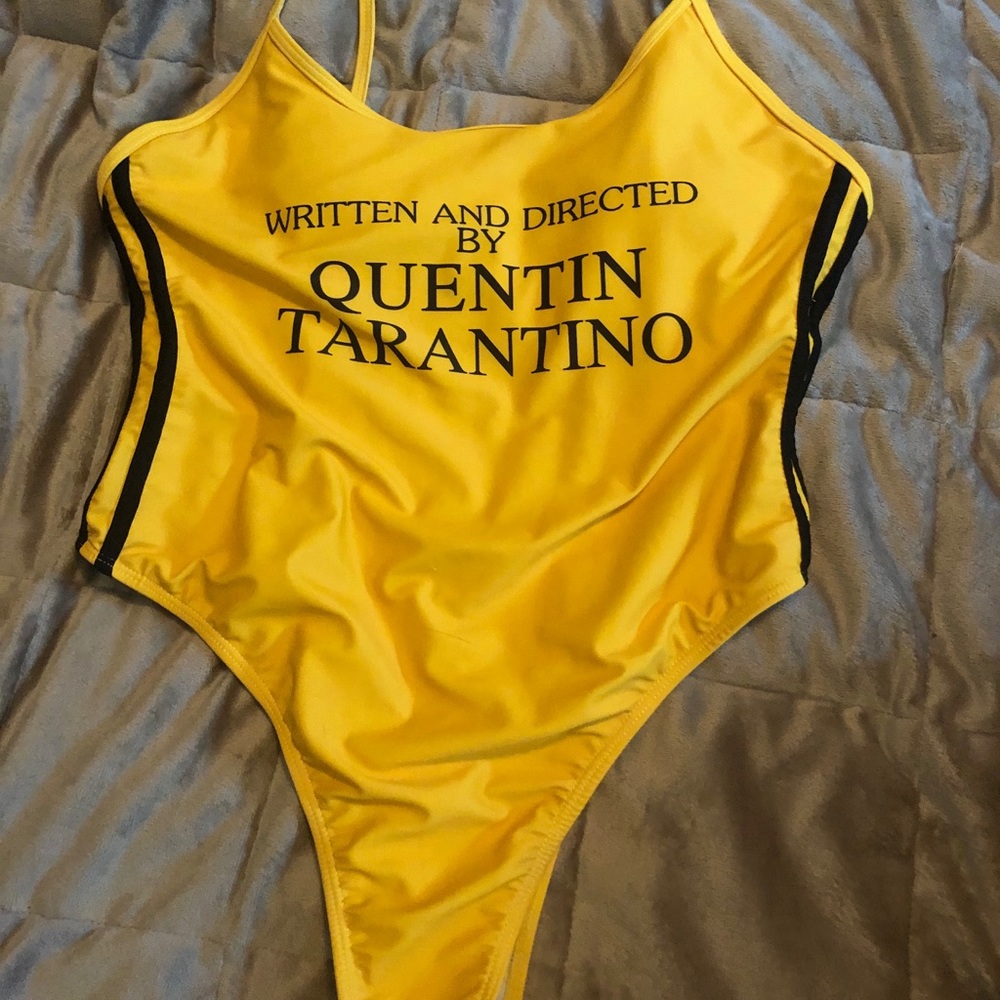 Quentin Tarantino cheeky yellow one piece